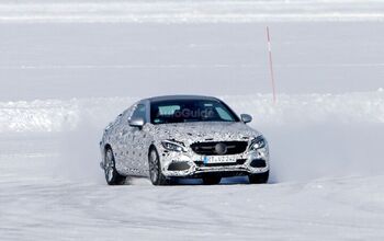 Mercedes C-Class Coupe Spied Sideways in the Snow
