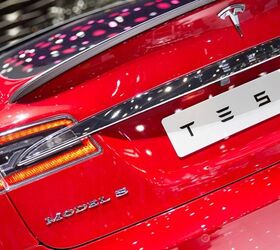 Tesla Selling Shares to Raise $500M