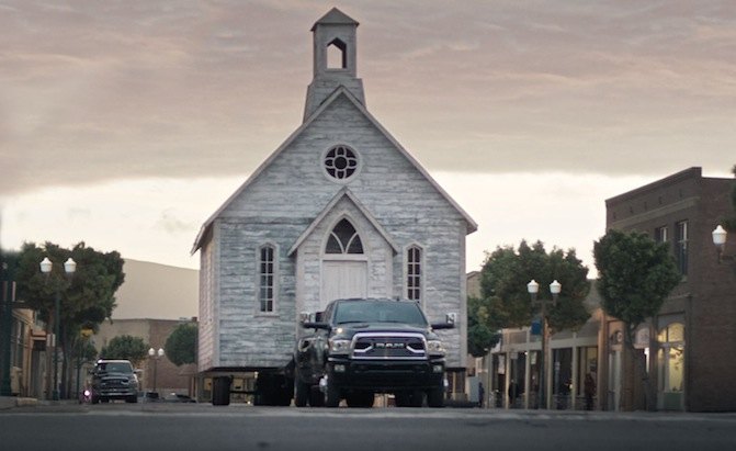 new ads feature a ram casually towing a church
