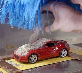 Why Nissan Has a Little Machine for Washing Diecast Cars