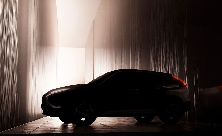 mitsubishi teases 2021 eclipse cross in showrooms early next year