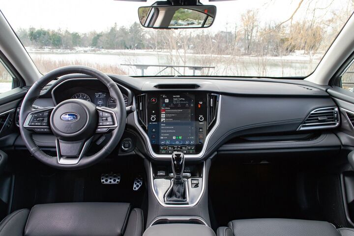 A simple yet elegant cabin, although the steering wheel features a tremendous amount of buttons.