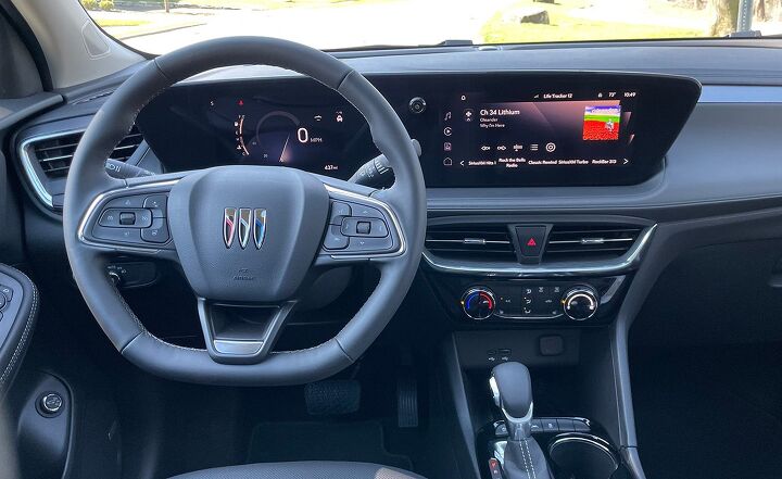 The mid-trim ST model shown here has features like wireless charging and wireless Apple CarPlay, a digital gauge cluster, and a large 11-inch infotainment screen. 
