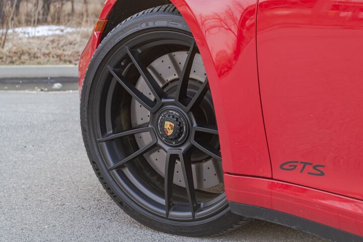The Carrera 4 GTS sports center-lock wheels in the same fitment as the 911 Turbo with staggered 20-inch front and 21-inch rears. 