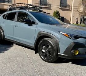 The new 2024 Subaru Crosstrek, kitted out like a true Subaru owner would do, complete with cargo basket and bike rack.