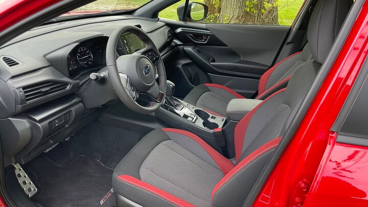 The RS trim gets unique  grey and black trim pieces as well as red inserts on the seats as well as  Those up front should appreciate the revised seats that feature better comfort. Plus the armrests on the door and center console now include added padding. 