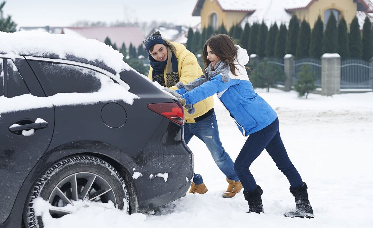 8 Steps for When Your Car is Stuck in The Snow | AutoGuide.com