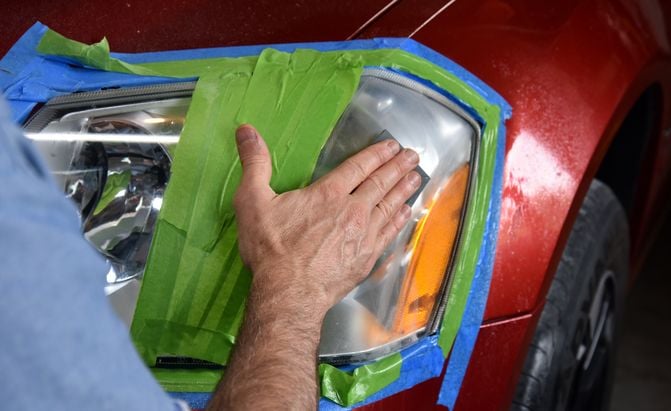 You can choose between hand sanding or using a drill attachment. Photo credit: David Traver Adolphus / AutoGuide.com,