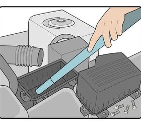 Clean the air filter housing with a vacuum cleaner. Image credit: Autoguide.com.