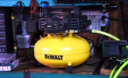 A pancake air compressor is too small for most air tools, but easy to move and great for inflating tires. Photo credit: David Traver Adolphus / AutoGuide.com.
