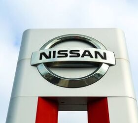 COSTA MESA, CA/USA – OCTOBER 17, 2015: Nissan Motors automobile dealership and sign.  Nissan Motors is is a Japanese multinational automotive manufacturer headquartered in Japan.