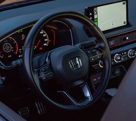 The 2023 Civic Si takes a huge step forward in interior quality. Red highlights are spread around the cabin while the Si model retains the unique new mesh dash insert of the standard Civic.