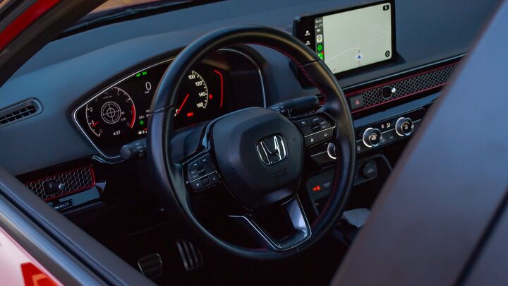 The 2023 Civic Si takes a huge step forward in interior quality. Red highlights are spread around the cabin while the Si model retains the unique new mesh dash insert of the standard Civic.