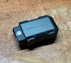 The tiny Bluetooth module plugs into the vehicle's OBD2 port and pairs with a smartphone. Photo Credit: Ross Ballot