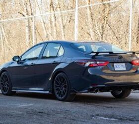 It's almost hard to believe a Camry with this stance, these big 19-inch wheels and an aggressive aftermarket-styled spoiler is a from-the-factory creation.