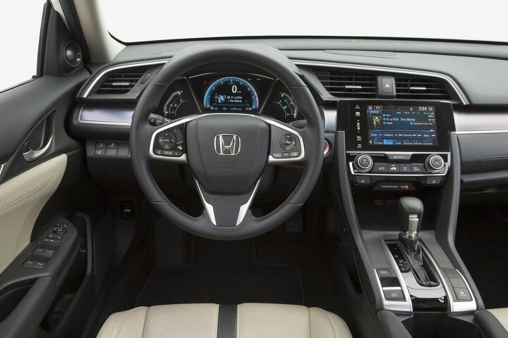 Modern cabin of the 2017 Honda Civic featuring the available digital dash and infotainment