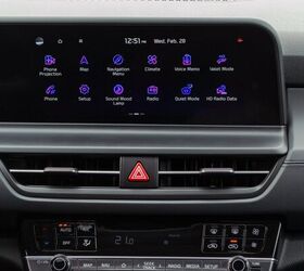 Kia's infotainment is feeling a little old now, and that cool color scheme makes it tough to use at a glance.