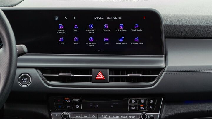 Kia's infotainment is feeling a little old now, and that cool color scheme makes it tough to use at a glance.