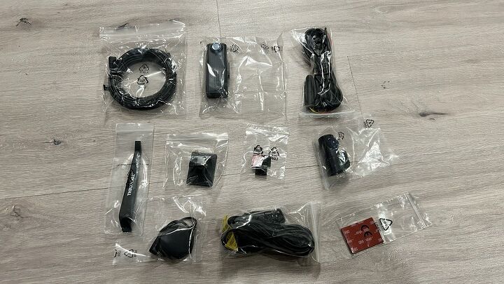 All of the items received in my front and rear Thinkware Q200 dash cam bundle. 