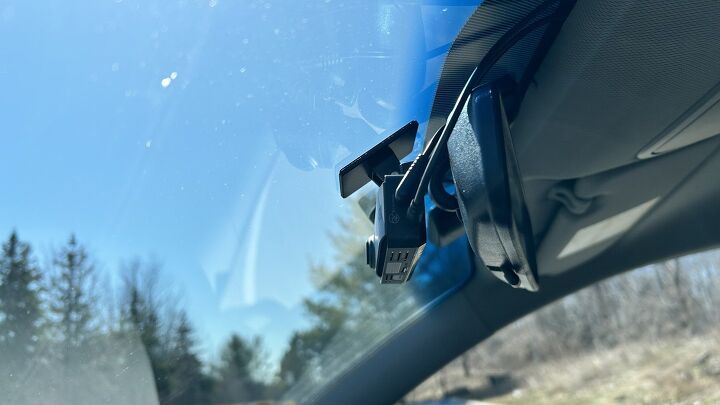 An image of the Thinkware Q200 dash cam installation form the driver's side windshield. 
