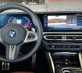 The interior is simple, yet luxurious inside the 2024 BMW M440i xDrive Gran Coupe. We really like the red seats