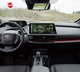 Stylish and distinctly cockpit-like, the Prius cabin is almost as dramatic a departure as the exterior. Image credit: Kyle Patrick