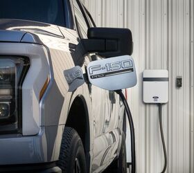 An F-150 Lightning charging with a Ford Pro 48-amp charger