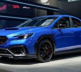 subaru teases wrx sti looking thing for october debut