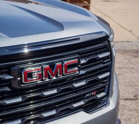 2026 gmc acadia at4 vs 2026 ford explorer tremor comparison