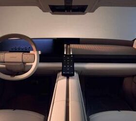 this is the sleek modern interior of jaguar s upcoming type 01 ev